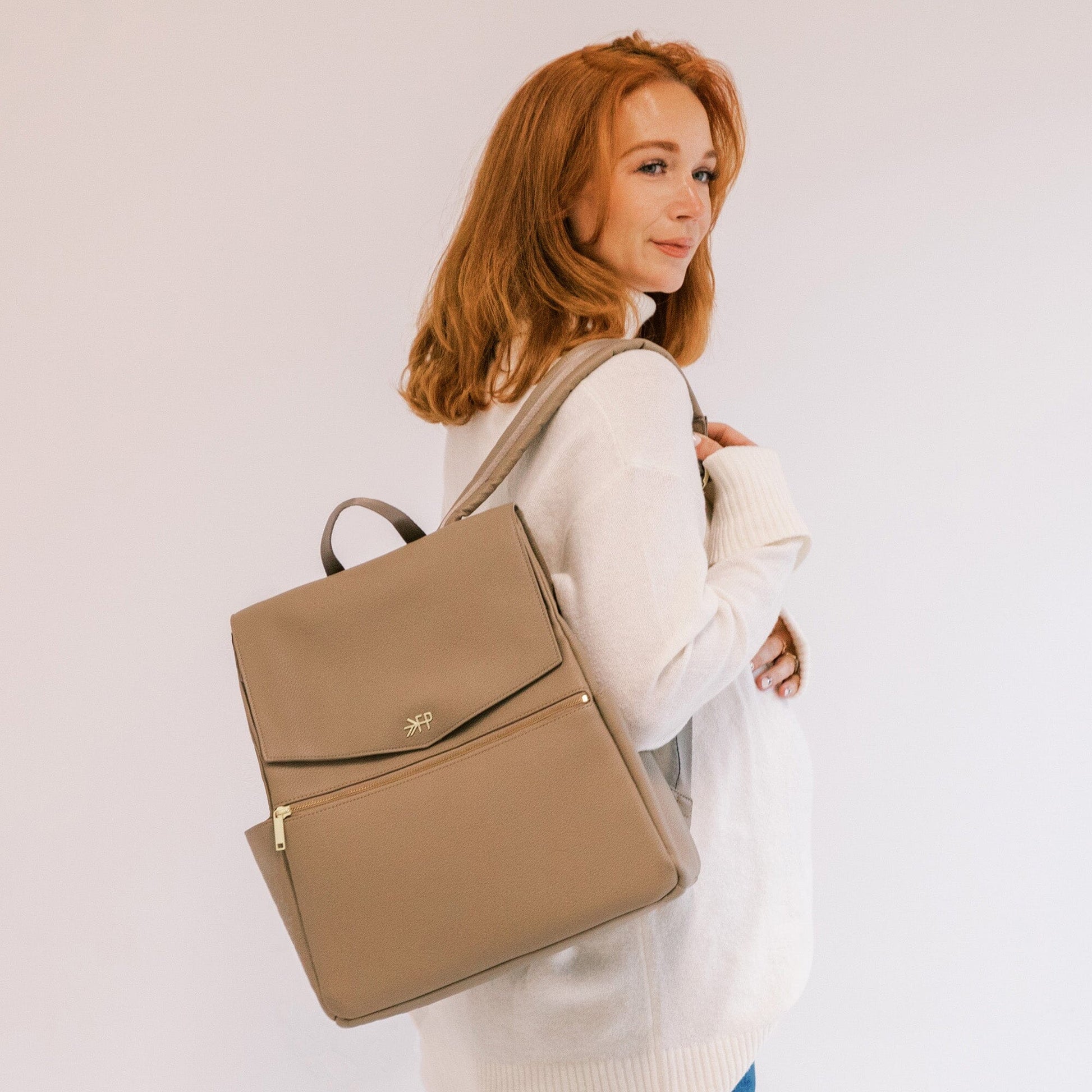 Aspen Classic Diaper Bag II in stone, back view.