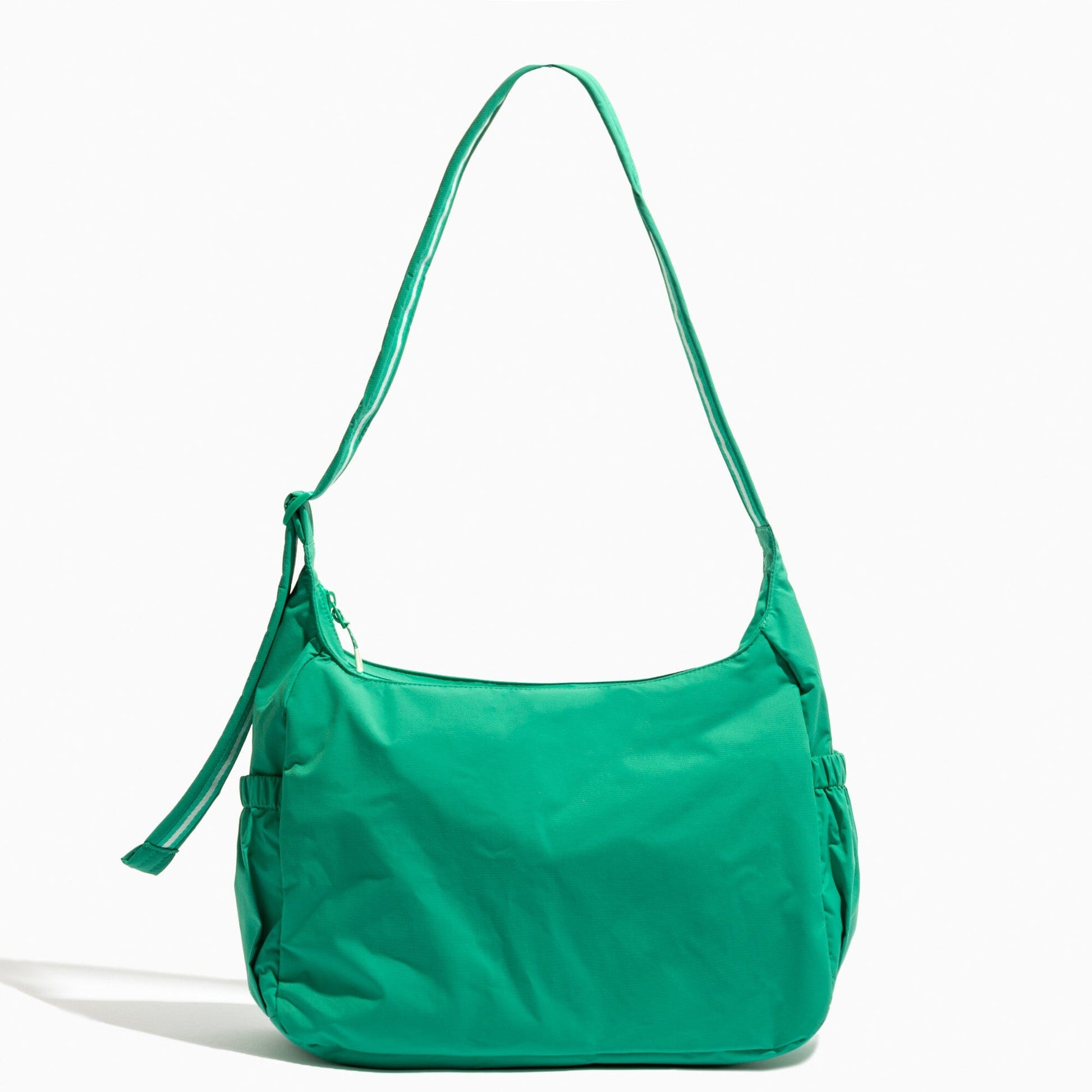 Front view of the Kelly Motion Carryall Tote in green.