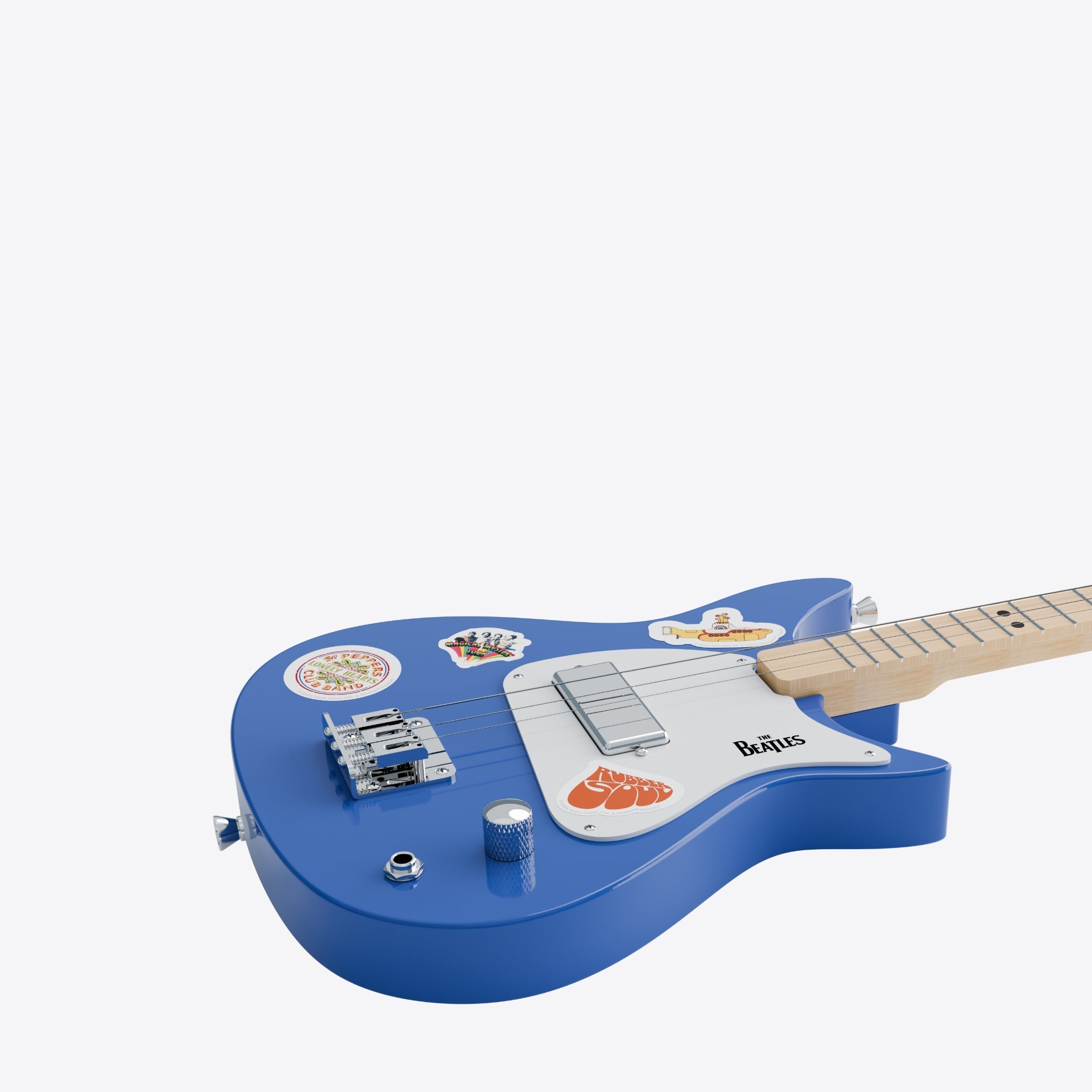 Beatles Loog guitar with Beatles stickers on the body.