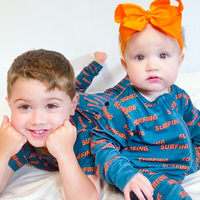 Ocean Cubs Wear Pipeline Dreams double zip footless sleeper, surfing print.