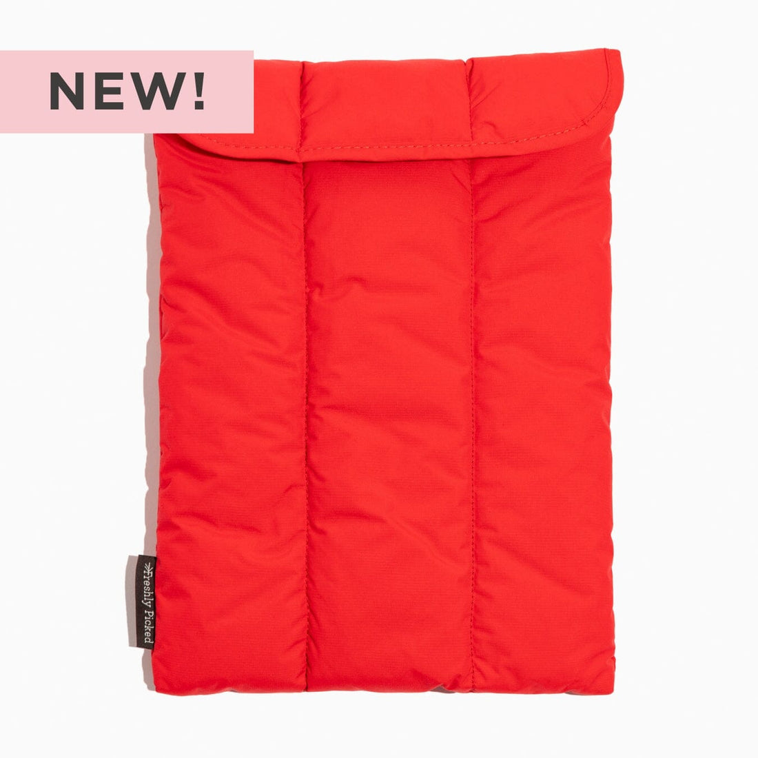 Cherry Motion Laptop Sleeve in vibrant red, padded and quilted design.