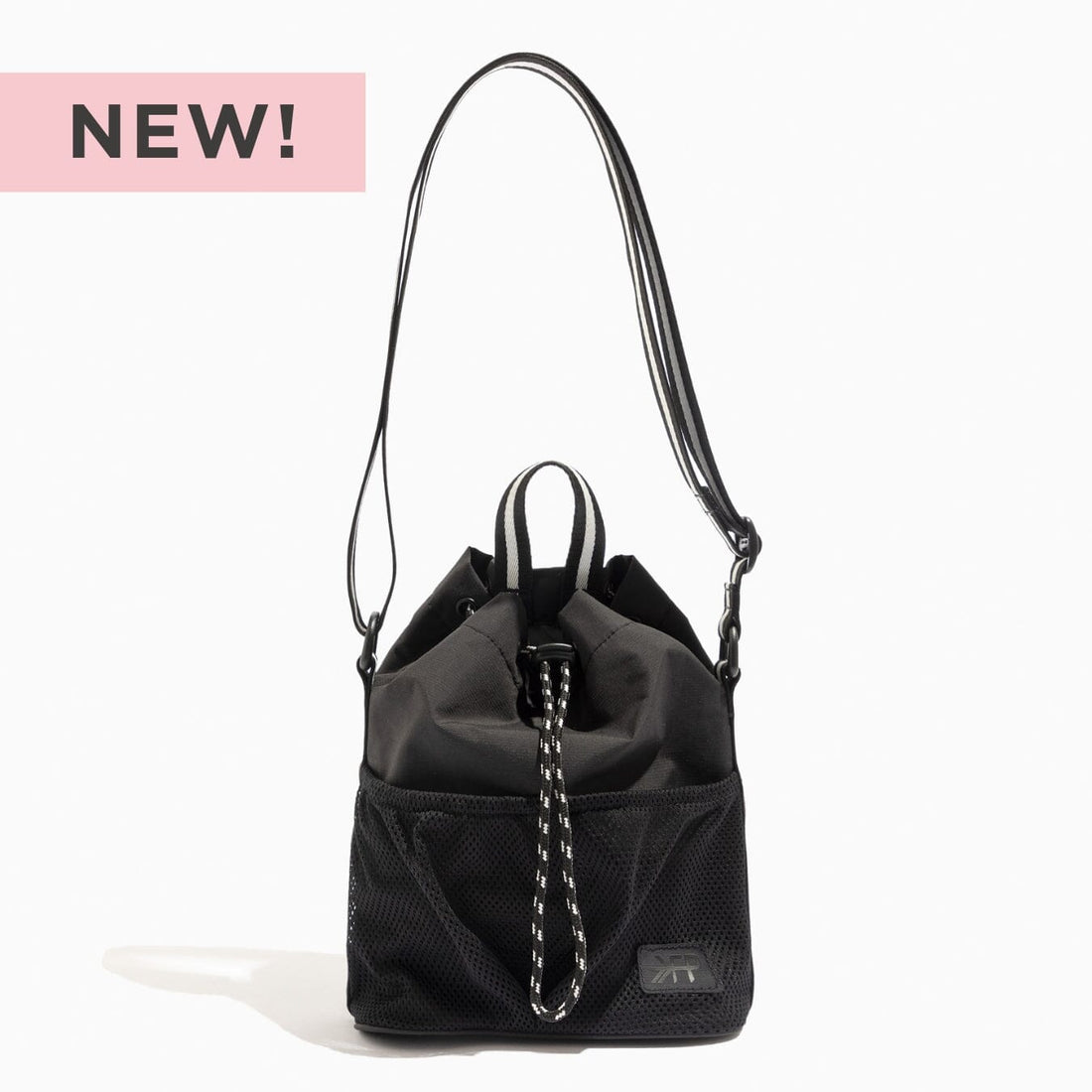 Jet Motion Bucket Crossbody bag in black, drawstring opening, and white striped strap.