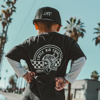 Toddler wearing 'Til Death Do We Ride' tee and LRT hat in desert landscape