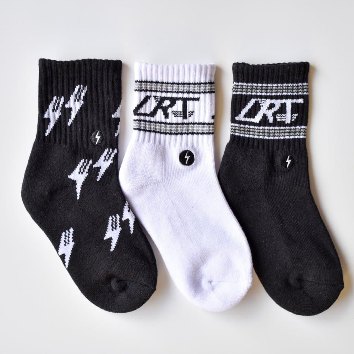 Classic Rock sock three-pack with black and white vintage designs.