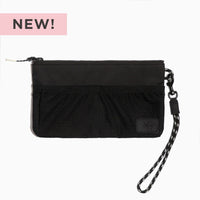 Jet Motion Wristlet Pouch in black nylon with wrist strap and mesh pockets.