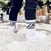 Classic Rock sock three-pack with black and white vintage designs.