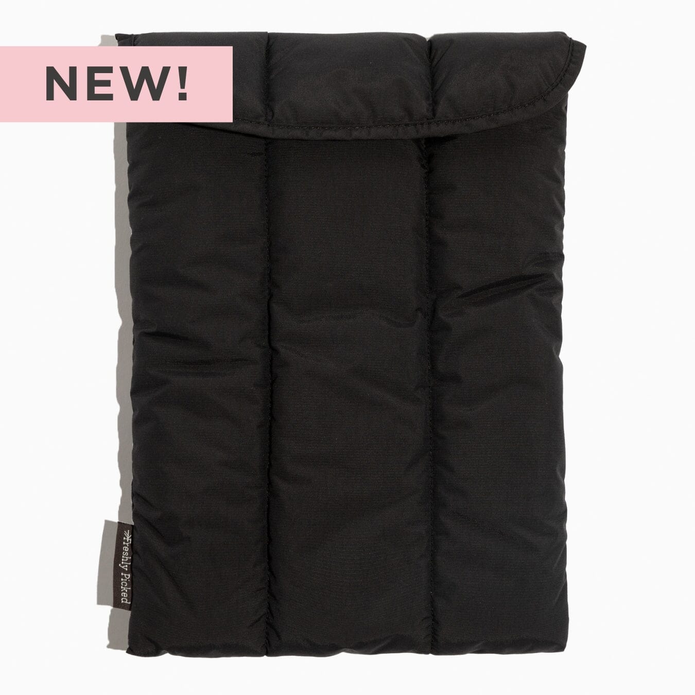 Jet Motion Laptop Sleeve in Black with 'NEW!' tag