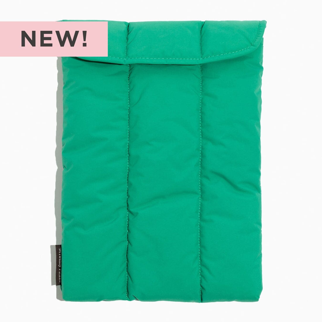 Kelly Motion Laptop Sleeve in green nylon with quilted padding and velcro closure.