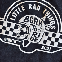 Close-up of 'Born To Ride' skull graphic on toddler t-shirt