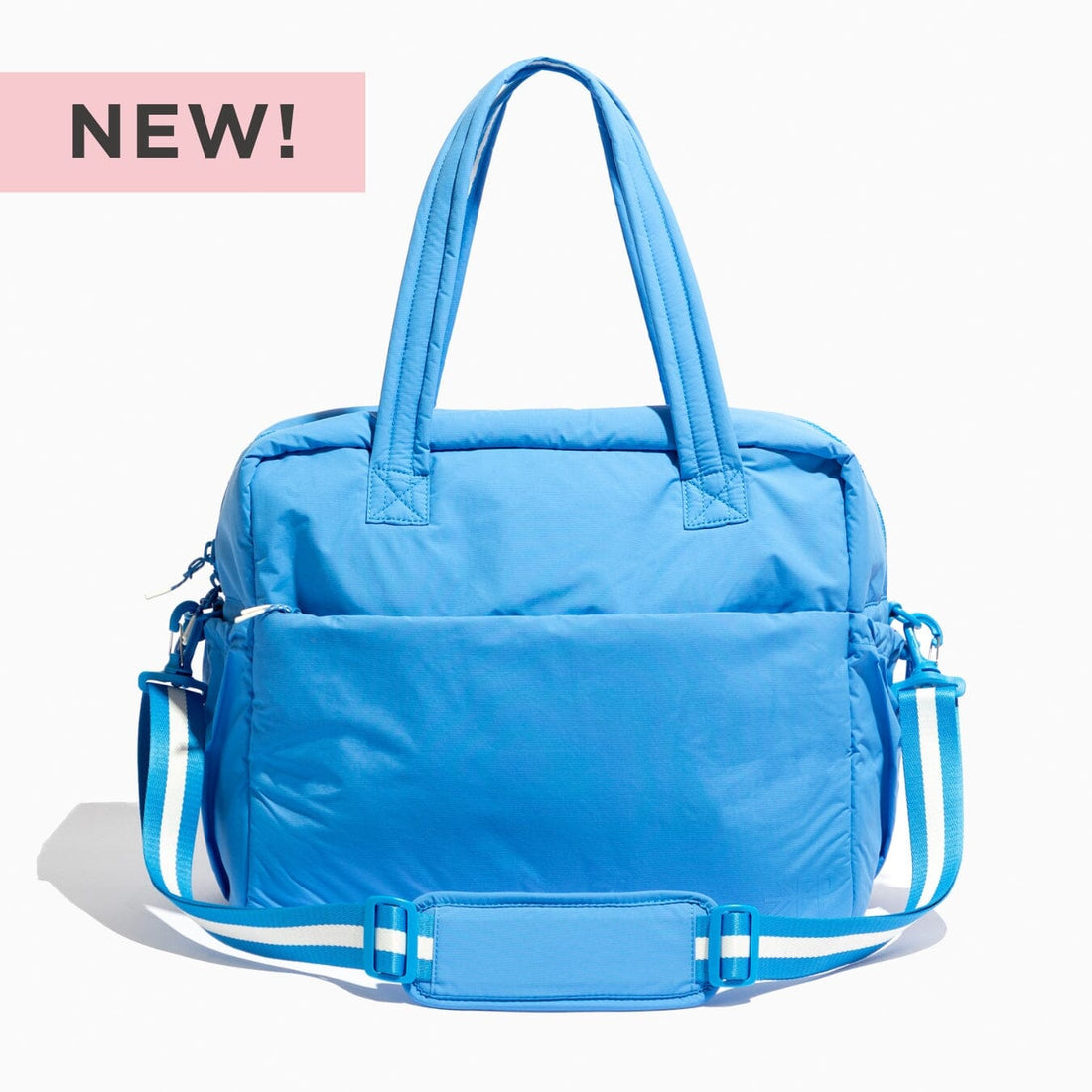 Wave Motion Overnight Duffle in blue with a 'New!' tag.