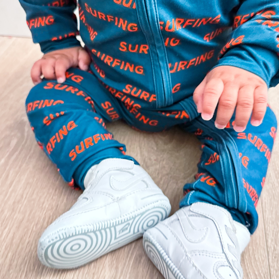 Ocean Cubs Wear Pipeline Dreams double zip footless sleeper, surfing print.