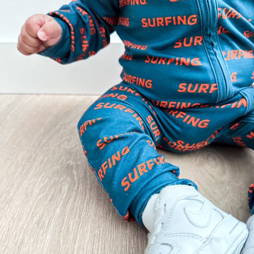 Ocean Cubs Wear Pipeline Dreams double zip footless sleeper, surfing print.