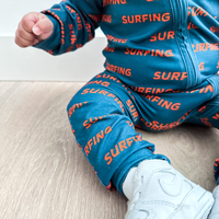 Ocean Cubs Wear Pipeline Dreams double zip footless sleeper, surfing print.
