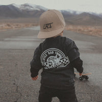 Close-up of 'Born To Ride' skull graphic on toddler t-shirt