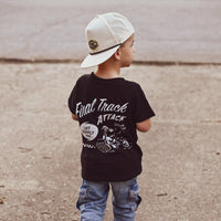 Boy in Final Track Attack black tee and mesh hat, back view.