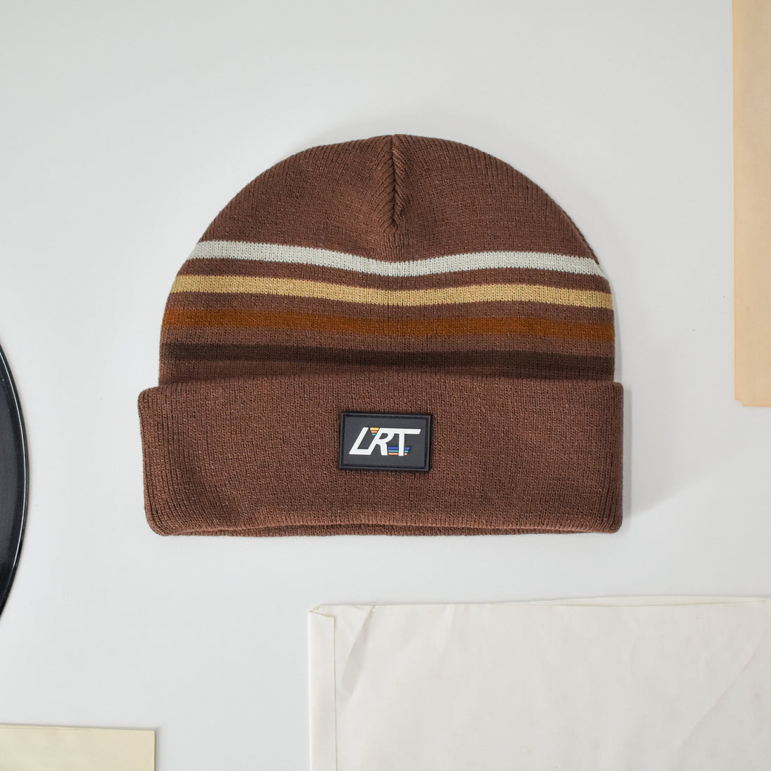 Striped Cocoa Beanie with LRT patch, retro style for kids.