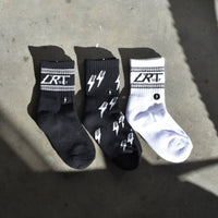 Three pairs of Classic Rock socks in black and white with the LRT logo.