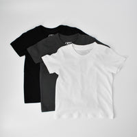 Rad Organics monochrome tee 3-pack, black, grey, and white shirts.
