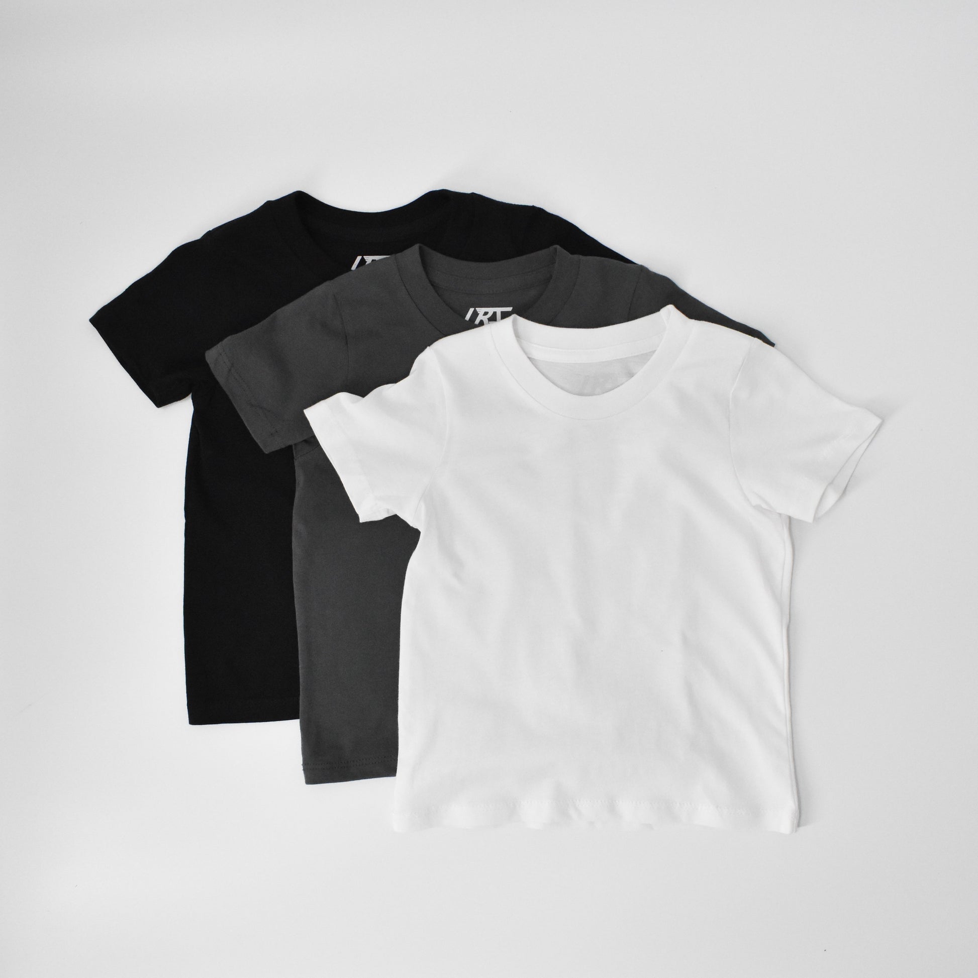 Rad Organics 3-pack tees in black, dark grey, and white.
