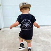 Stay Swell black tee, close-up of fabric and design