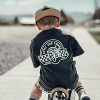 Toddler on bike wearing 'Til Death Do We Ride' graphic tee