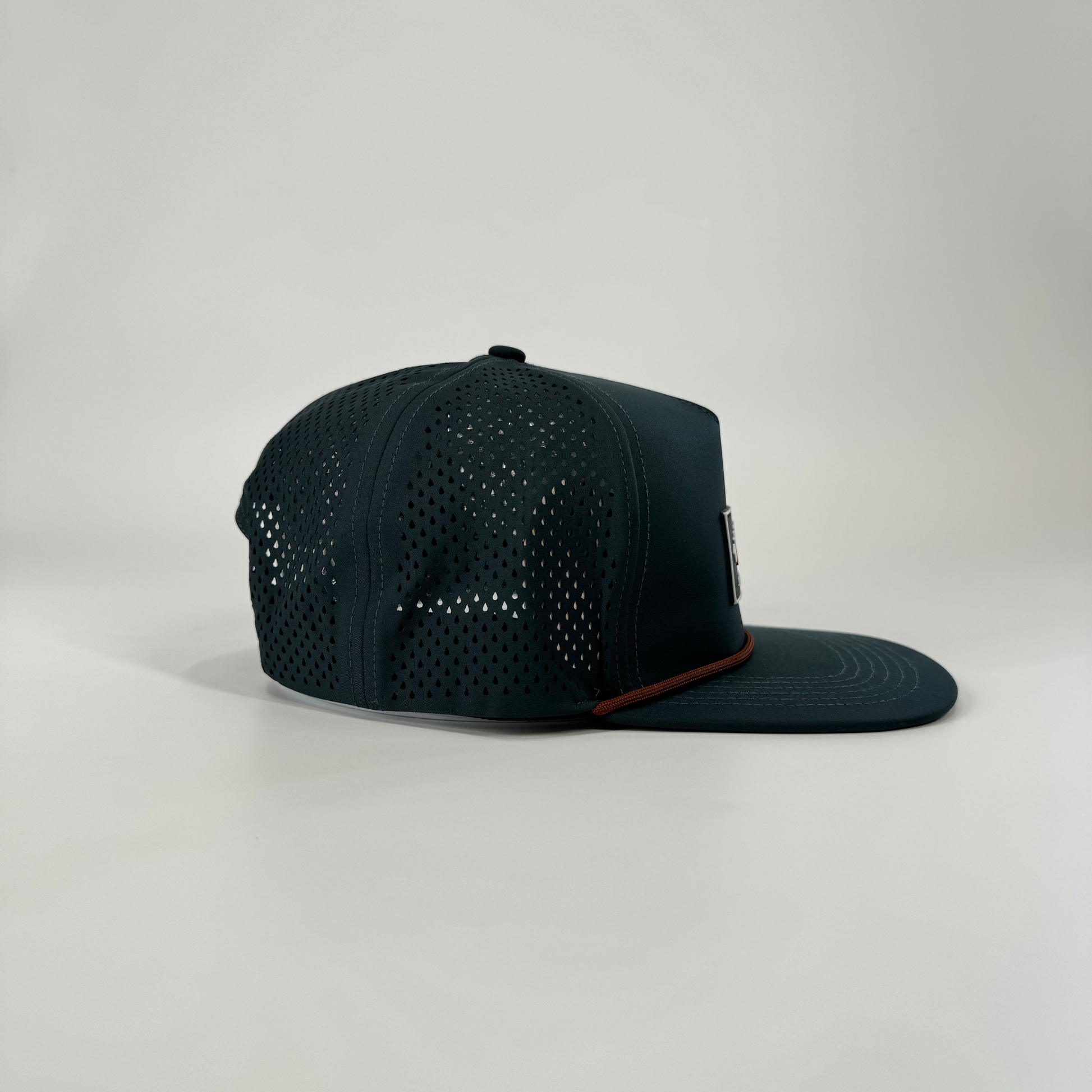 Juniper Green Waterproof Explorer Snapback Hat with laser-cut tear drops.