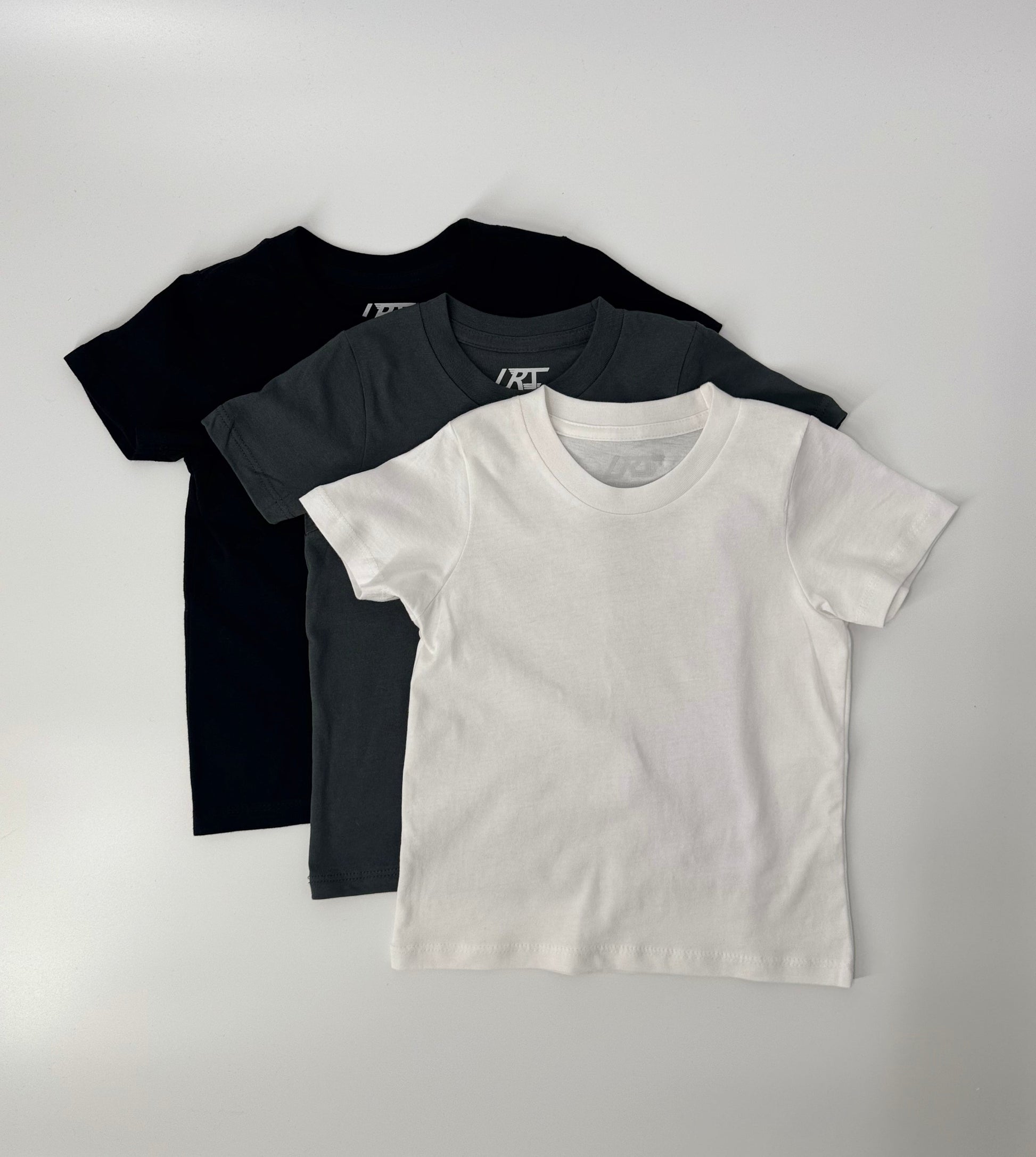Close-up of Rad Organics monochrome tee 3-pack.
