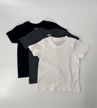 Close-up of Rad Organics monochrome tee 3-pack.