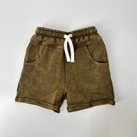 Army green vintage wash shorts with drawstring waist, flat lay.