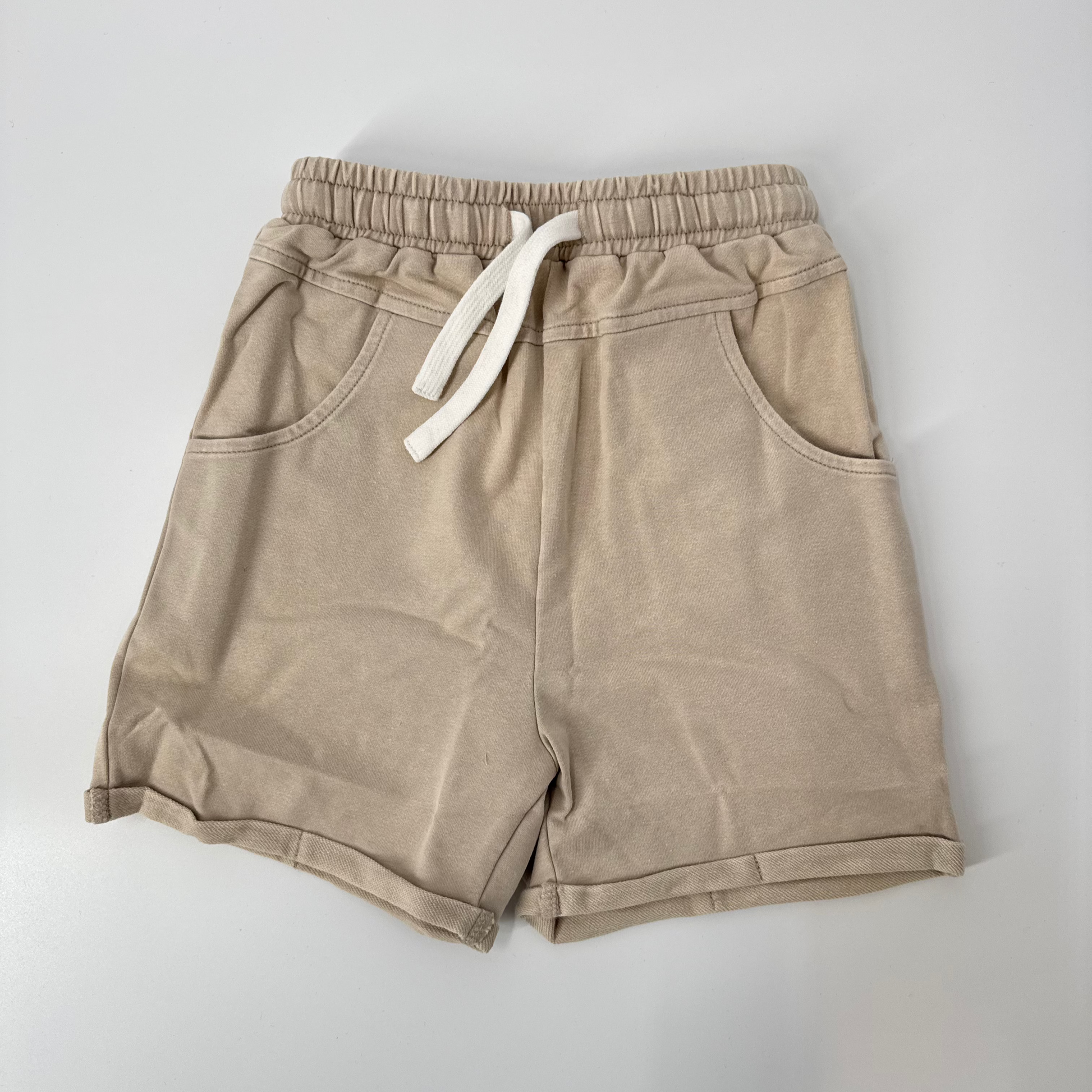 Khaki vintage wash shorts for kids with elastic waistband and drawstring.