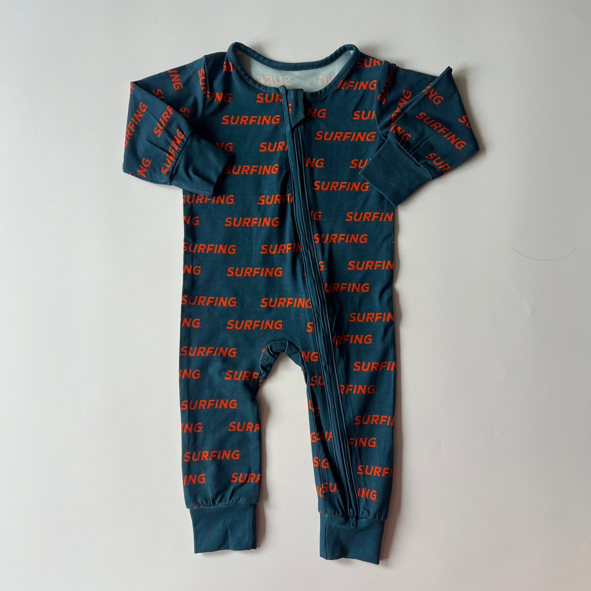 Ocean Cubs Wear Pipeline Dreams double zip footless sleeper, surfing print.