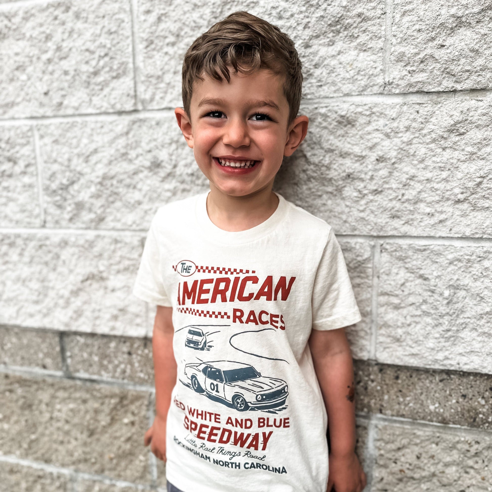 The All American Races cream tee for kids, soft cotton.