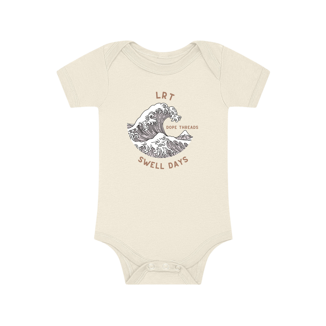 Close-up of cream Dope Threads Swell Days onesie with wave design.