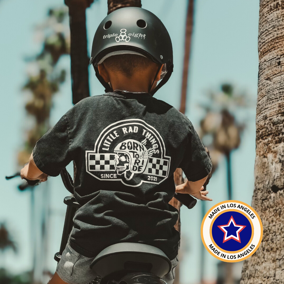 Close-up of 'Born To Ride' skull graphic on toddler t-shirt