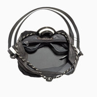 Interior view of the Jet Motion Bucket Crossbody bag showing pockets and spacious compartment.
