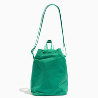 The back of the Kelly Motion Bucket Crossbody bag in green.