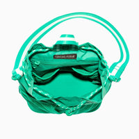 The inside of the Kelly Motion Bucket Crossbody bag in green.