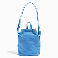 Back view of the Wave Motion Bucket Crossbody bag in blue.