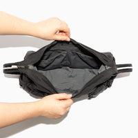 Inside view of the Jet Motion Carryall Tote showing the interior compartments.