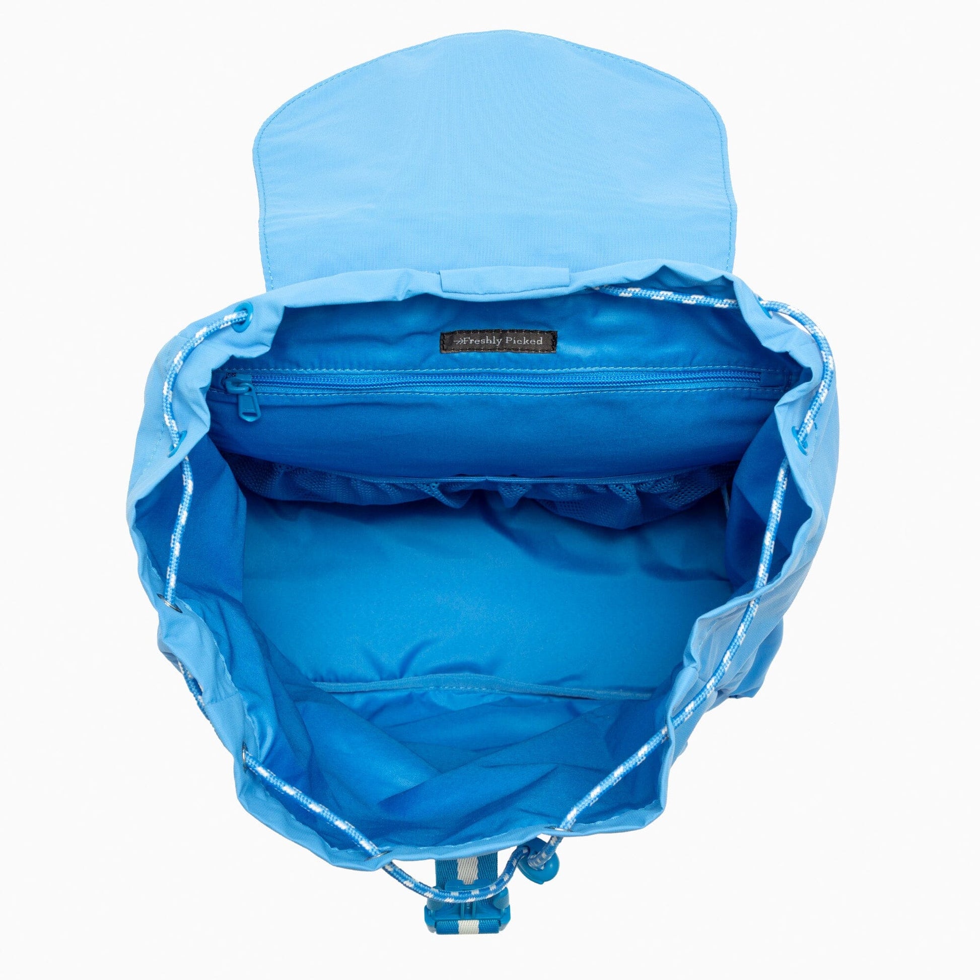 Interior view of the blue Wave Motion Drawcord Backpack.