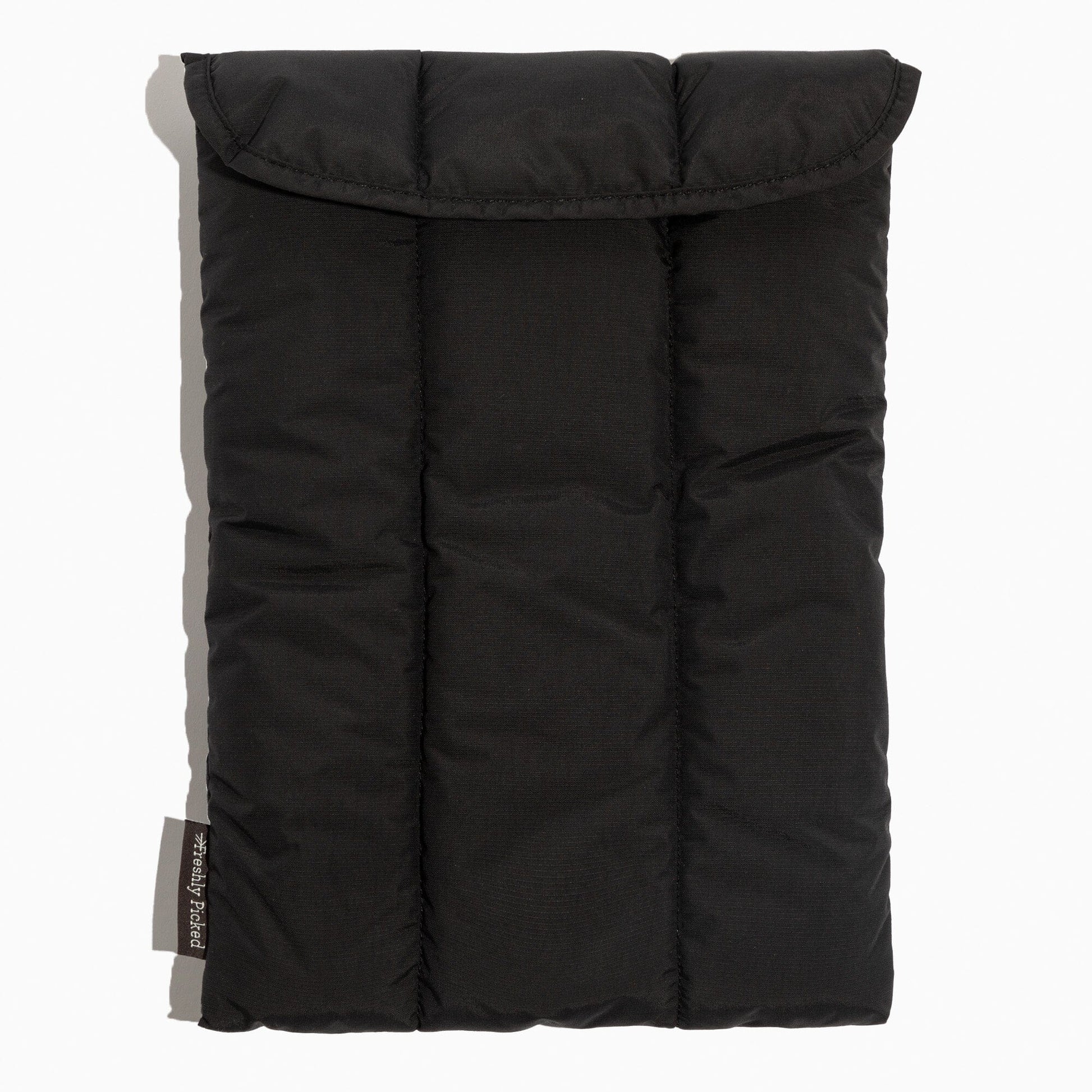 Front view of the quilted Jet Motion Laptop Sleeve in black