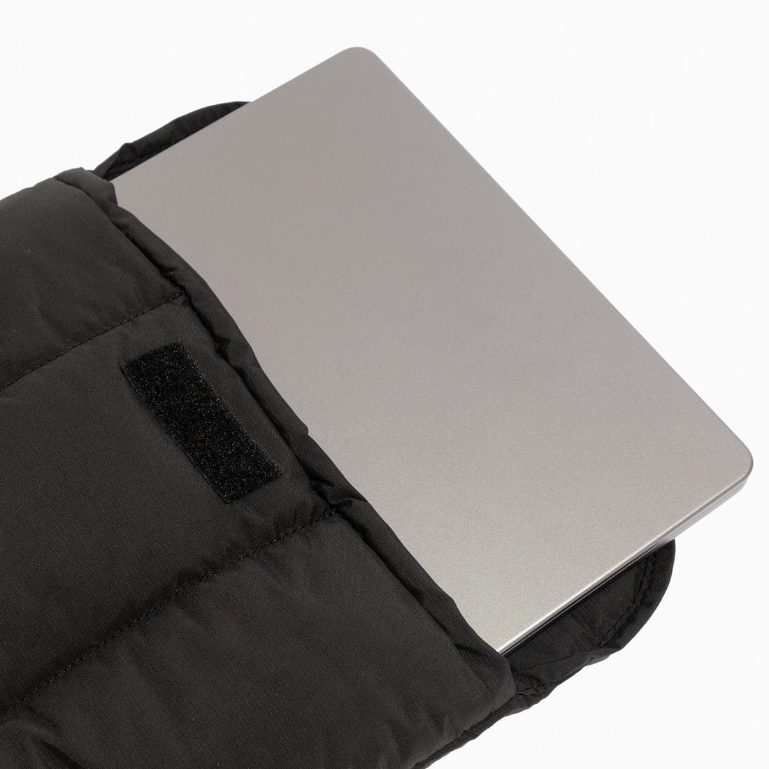 Close-up of a laptop inside the padded Jet Motion Laptop Sleeve