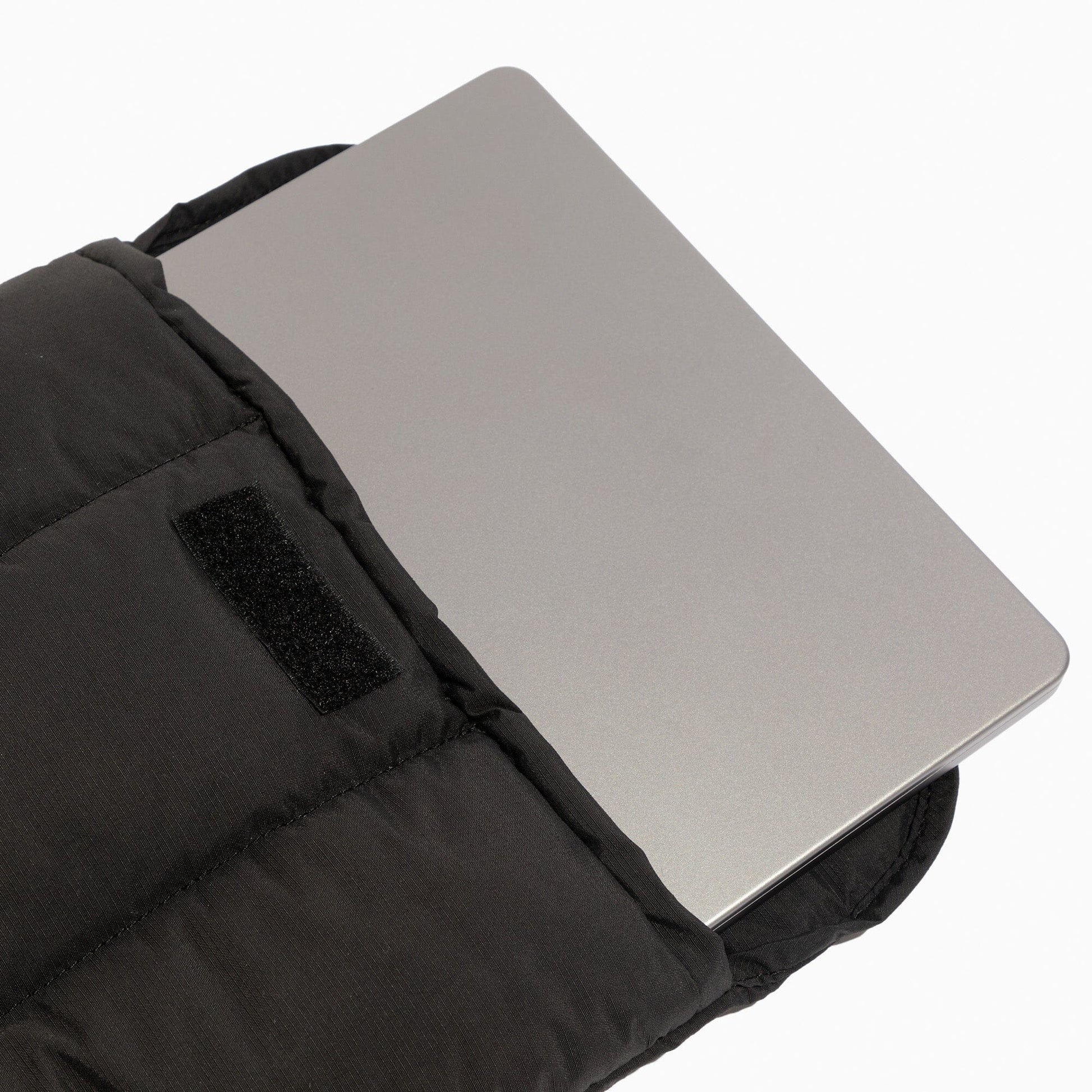 Close-up of a laptop inside the padded Jet Motion Laptop Sleeve