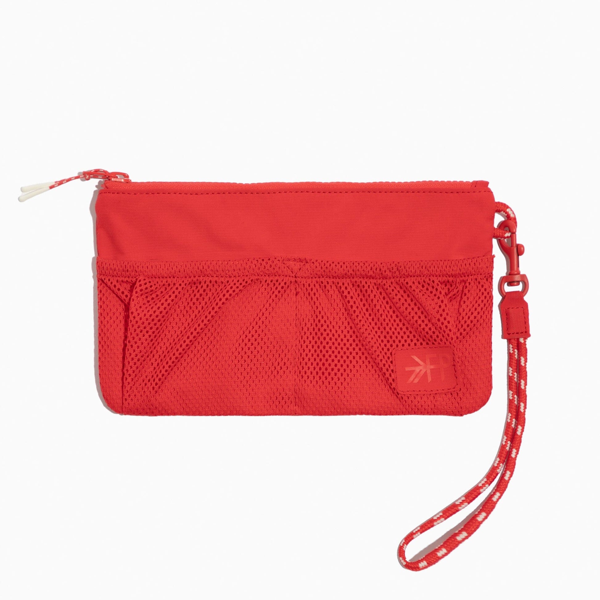 Close-up of the Cherry Motion Wristlet Pouch in red with exterior mesh pockets.