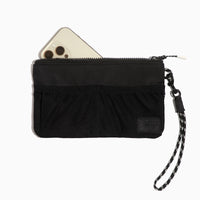 Jet Motion Wristlet Pouch with a phone showing the mesh pocket.