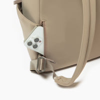 Aspen Seoul Neoprene City Backpack in Sand color, front view.
