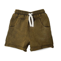 Army green vintage wash shorts with pockets and rolled hem.