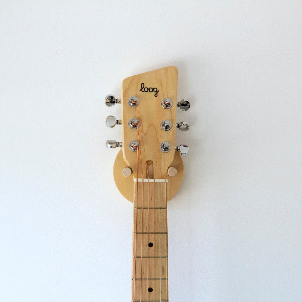 Loog guitar wall hanger that will look amazing in their bedroom.