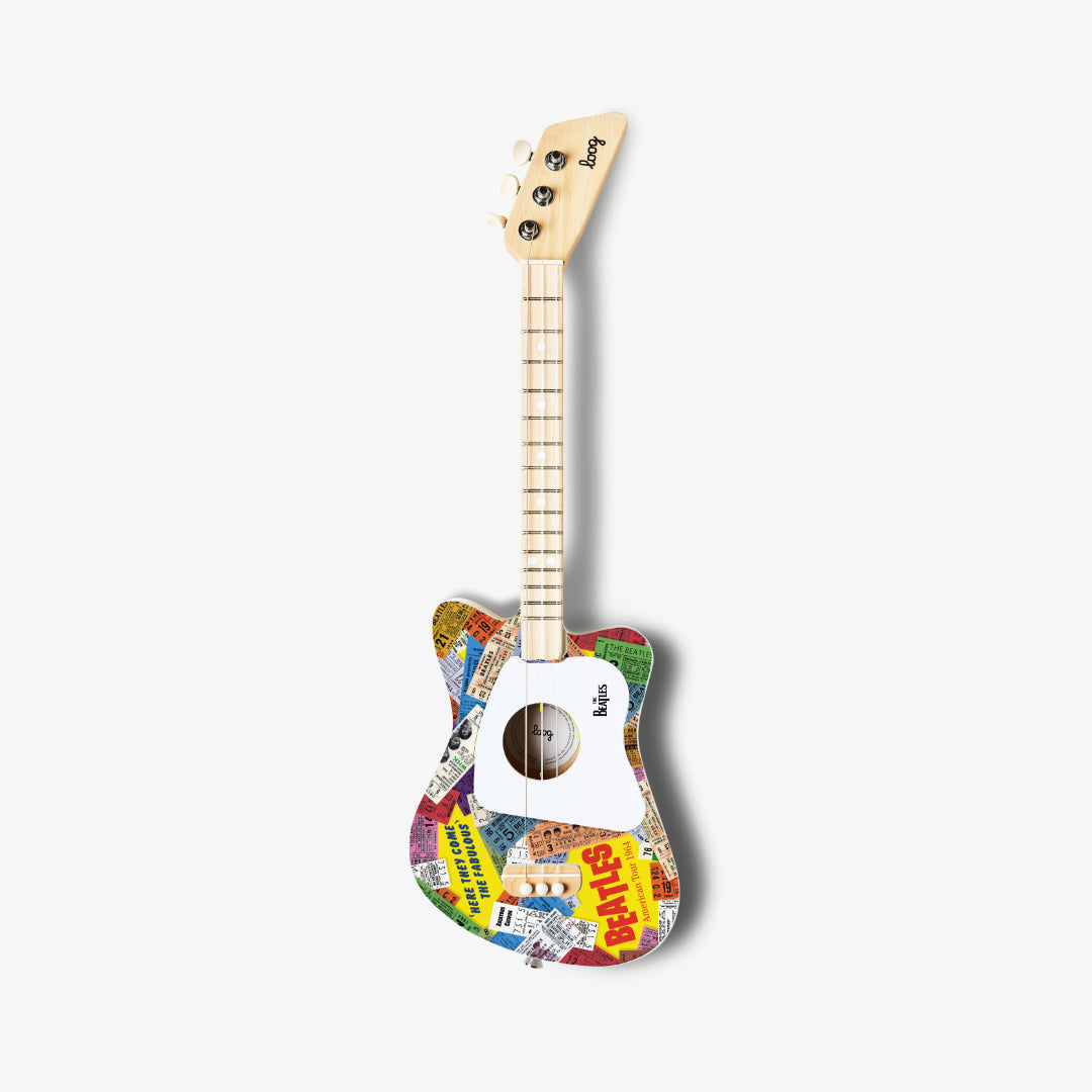 Full view of The Beatles Loog Mini Guitar with white background.