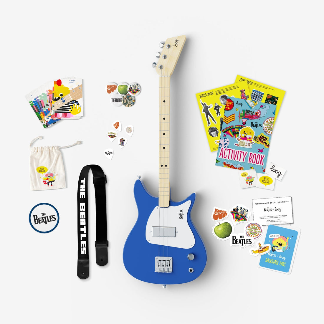 Blue Beatles Loog electric guitar bundle for kids with learning materials and accessories.